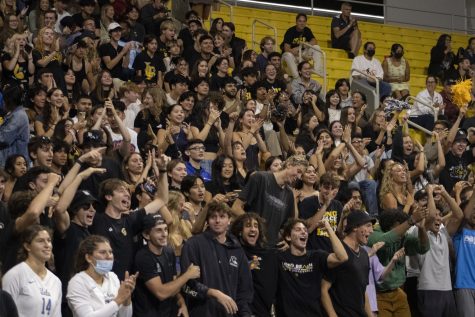 09/02/2023 - Long Beach, Calif: The Long Beach State student section cheers on the women's volleyball team as they took on UCLA inside the Walter Pyramid. Despite the energy and support from the crowd, the Beach would fall to the Bruins 1-3.