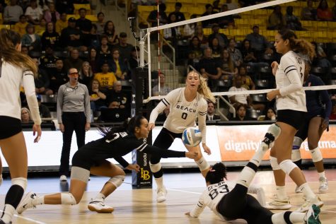 10/14/2023 - Long Beach, Calif: Throughout the game, The Beach constantly rushed to the ball as outside hitter Natalie Glenn (#83 white) and defensive specialist Savana Chacon dove to the ball at the Walter Pyramid. Chacon had five assists and Glenn scored eight kills, which was the third-highest on the team.
