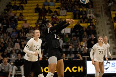 10/14/2023 - Long Beach, Calif: Long Beach State women's volleyball defensive specialist Savana Chacon hits the ball up for one of her teammates during the rivalry game against the Titans at Walter Pyramid. Chacon scored six digs, which was second on the team.