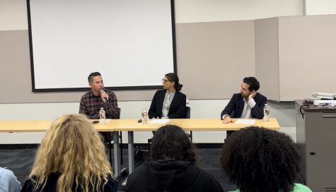10/19/23- Adam Elmahrek (right), sits with discussants Sabrina Limahomed(middle) and Justin Gomer as they prepare to take questions from the audience.