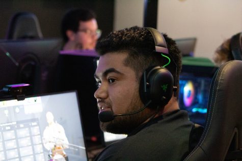 Long Beach State master student David Rodriguez gives his Counter Strike 2 gold team members his thoughts on their next moves in the second map of their game against the University of San Francisco. Long Beach would win the second map 13-5, bringing the match to a third map.