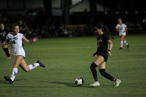10/5/2023 - Long Beach, Calif: Cherrie Cox, sophomore forward, drives the ball up to Cal Poly territory as she tries to get LBSU on the board on Oct. 5's game against the Mustangs at George Allen Field. Cox led the team with four shots and two shots on goal.