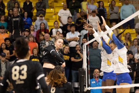 10/14/2023 - Long Beach, Calif: 10/14/2023 - Long Beach, Calif: Long Beach State women's volleyball outside hitter Elise Agi hits the ball sideways at the UC Riverside defenders as her team wins in a 3-0 sweep at the Walter Pyramid. Agi was second in kills with eight and scored two digs for The Beach.