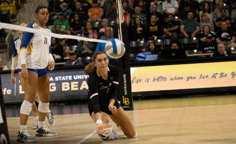 10/14/2023 - Long Beach, Calif: Long Beach State women's volleyball setter Zayna Meyer dives for the ball during the UC Riverside. Meyer led the team with a .750 hit percentage and was third on the team with six kills.