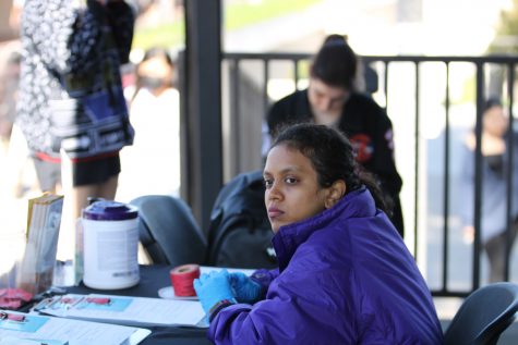 10/17/2023 - Long Beach, Calif: Operating the front desk is Bhavana Sringeri, Peer Health Educator for CSULB's Student Health Services, during the recent Flu Clinic event with around 20 students showing up to get their shots.