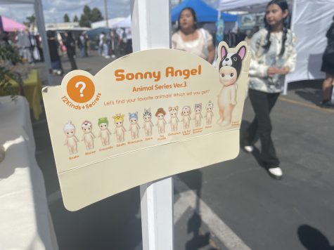 A Sonny Angel sign that depicts the Animal Series Collection. The image captured the interest of the shoppers.
