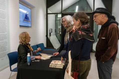 10/26/2023 - Long Beach, Calif: Rosa Lowinger signed copies of "Dwell Time: A Memoir of Art, Exile, and Repair" for attendees after her discussion at the Carolyn Campagna Kleefeld Contemporary Art Museum on Thursday.