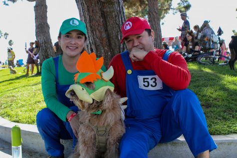 10/29/23 BELMONT SHORE, LONG BEACH: Marlene and Robert Augur from Lake Forest with their dog Mito dressed as Mario, Luiji and Bowser.