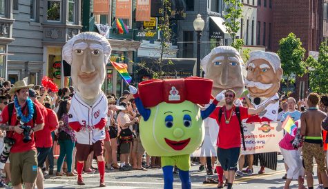 The presidential mascots for the Washington Nationals walk along the DC Capital Pride festival route in 2014.