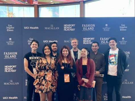 10/15/23 - Long Beach, Calif.: Short film directors, actors and friends pose for the press with bright smiles, following the debut of six CSULB short films at the Newport Beach Film Festival.