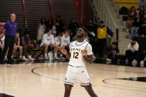 Long Beach State men's basketball junior guard Jadon Jones celebrates making a three point shot in the home opening game inside the Walter Pyramid. Jones shot an efficient 5-6 from three point range and finished with 17 points.