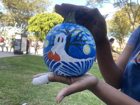 Students followed instructions from Beach Pride event leaders to paint a spooky Halloween-themed pumpkin.