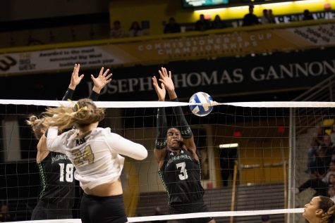11/25/23 - Long Beach, Calif: Long Beach State's outside hitter Elise Agi spikes the ball onto two Hawai'i opponents and had a game-high 26 total attempts. Agi would lead the team in kills with eight.