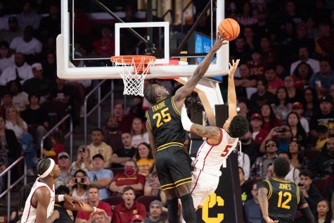 12/10/2023 - Los Angeles, Calif: Long Beach State men's basketball junior forward Aboubacar Traore blocks a lay-up attempt by USC guard Boogie Ellis in their matchup inside the Galen Center. Traore finished the game with eight points and eight rebounds as the Beach took down the Trojans in overtime.