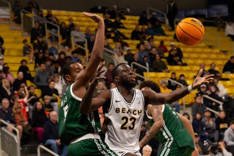 1/18/23 - Long Beach, Calif: Long Beach State forward Lassina Traore loses the ball for a couple of seconds as he fights for the offensive rebound Thursday at The Walter Pyramid. Traore would score 13 points and six rebounds against Hawai'i.