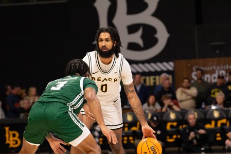 1/18/23 - Long Beach, Calif: Long Beach State guard Marcus Tsohonis picked the ball up from half court as he reads the defense and what play The Beach is running. Tsohonis assisted Jadon Jones with his first dunk as Long Beach State outscored Hawai'i 45-28 in the first half.