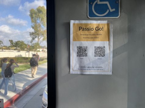 12/08/2023  -  Long Beach, Calif: The Passio GO app's QR code can be seen on a piece of paper inside each shuttle. Photo credit: Carlos Yakimowich