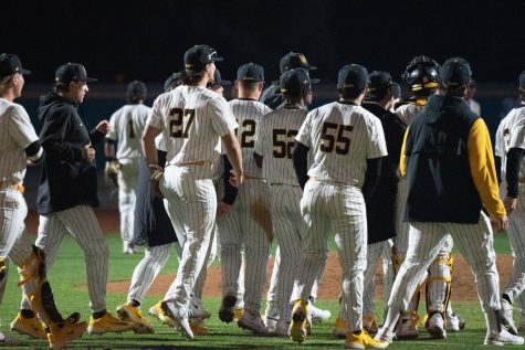 The Long Beach State Dirtbags celebrate their home-opening win over the University of Washington at Blair Field. The Dirtbags would score 10 innings to start off their season and their series against the Huskies.