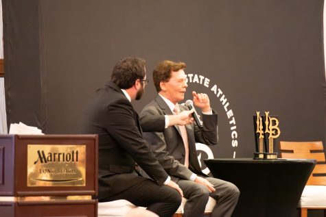 Former Long Beach State women's volleyball head coach Brian Gimmillaro (right) being interview the562.org co-founder Mike Guardabascio duting the Long Beach State Hall of Fame ceremony at the Long Beach Marriott.