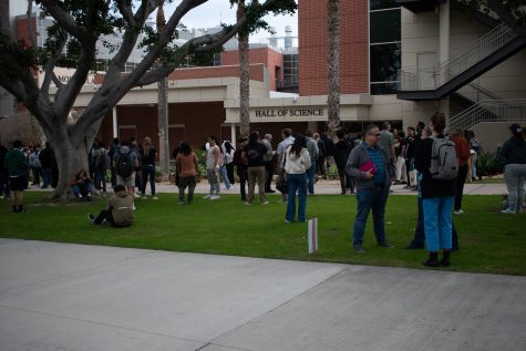 CSULB students and faculty evacuate from the Hall of Science building during an all-campus evacuation drill on Friday, Feb. 16. Everyone was allowed to go back at around 10:45 p.m. as the drill lasted about 15 minutes.
