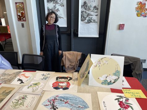 02/12/24 - Artist Chengjian Wang showcases her oil-painted artwork in honor of the Lunar New Year. The event also featured traditional Asian food, performances and dancing.