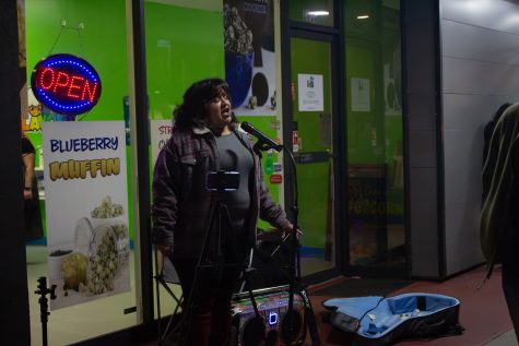 03/01/2024 - Long Beach, Calif: Marie Noriega performs her favorite songs by historical female musicians in front of Pop'N Flavors in Bixby Knolls. Photo Credit: Mariana Ramos