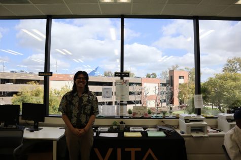 3/4/24 Justin Nguyen, four-year Accounting major and a coordinator for the VITA program at the booth in COB 243.