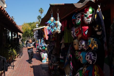 02/28/2024 - LOS ANGELES, Calif.: Luchador masks hang outside a stand on Olvera Street. Olvera Street is home to many shops that sell various authentic Mexican goods.