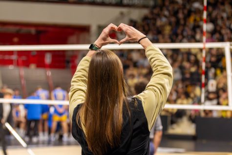 2/09/24 - Long Beach, Calif: Long Beach State announced that Natalie Reagan will be the interim head coach for the women's volleyball team. During the third set of The Beach game against UCLA, she gave a heart to the student section and fans cheered loudly to show their support.