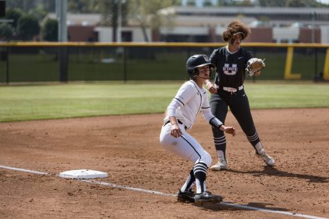 Long Beach State softball's junior, infielder, Jacquelyn Bickar attempted to steal home plate during the game against Utah State. The last game in the Louisville Slugger Invitational would make LBSU's record 4-21.