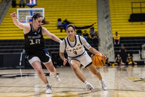 Long Beach State women's basketball junior guard Patricia Chung attempts to cut off her defender to set up her shot. Chung made three 3-pointers against the Anteaters. LBSU would come short, losing 76-86 at the Walter Pyramid.
