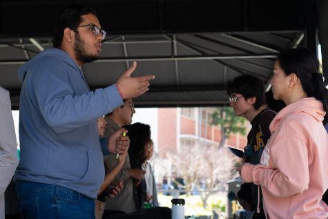 3/11/24 - Long Beach, Calif: Potential vice president of finance Jaimin Suthar talks with students during the coffee with the candidates at noon at the Bookstore Walkway. Suthar will be running alongside Sheesh Dhawan, who would be the executive vice president if they win, and Archie Sehgall, who is running for ASI president.