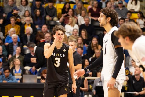 2/09/24 - Long Beach, Calif: (From left to right) Senior libero Mason Briggs, junior outside hitter Sotiris Siapanis and senior outside hitter Clarke Godbold gameplan on what to do as they went up against UCLA. Briggs set the team up with 40 assists as Long Beach State beat the Bruins 3-1 at the Walter Pyramid.