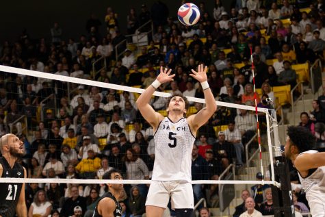 3/16/24 - Long Beach, Calif: Setter and redshirt senior Aidan Knipe volleys the ball up in the air to set up one of his multiple teammates against Hawai'i at the Walter Pyramid. Knipe had a career-high 11 digs against the Warrior Warriors as Long Beach State won 3-2 against the then No. 1 Hawai'i.