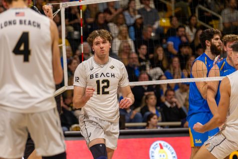 2/09/24 – Long Beach, Calif: Senior outside hitter Clarke Godbold celebrates one of his 12 kills against the then-No. 4 UCLA at the packed-out Walter Pyramid. Godbold scored 12 kills, which was third on his team, with three digs and two assists as Long Beach State beat the Bruins 3-1.