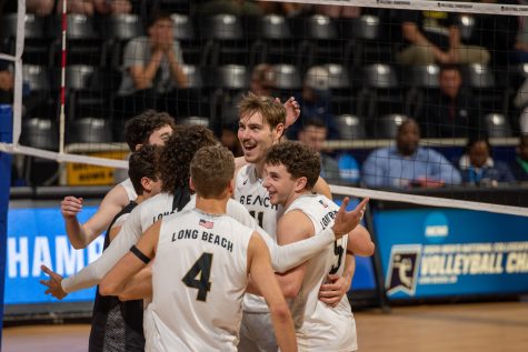 The Long Beach State men's volleyball team celebrate scoring a point during the third set of their NCAA National Championship tournament first round matchup against Belmont Abbey. The Beach would sweep Belmont Abbey 3-0 to advance to the next round.