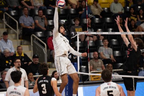 Long Beach State men's volleyball junior outside hitter Sotiris Siapanis goes for a kill against Belmont Abbey in the first round of the NCAA National Championship tournament. Siapanis would record 11 kills and six digs in the sweep against Belmont Abbey.