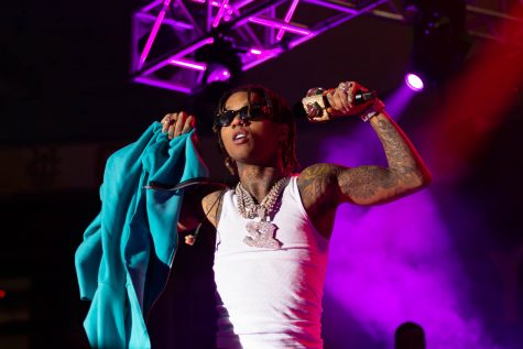 4/21/24 – Long Beach, Calif: Swae Lee flexes his arms to the audience after taking his jacket off, starting with "No Flex" to get the crowd on their feet. Lee was climbing on the set and smiling throughout his Long Beach State performance at the Walter Pyramid.