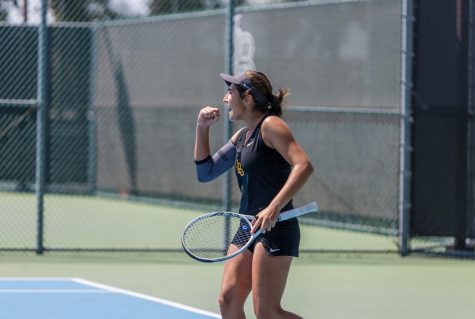 LBSU's tennis, sophomore, Doga Akyurek celebrated after scoring a point off her serve. Akyurek and doubles partner, sophomore, Paulina Franco won the first doubles match of the day against UC Irvine.